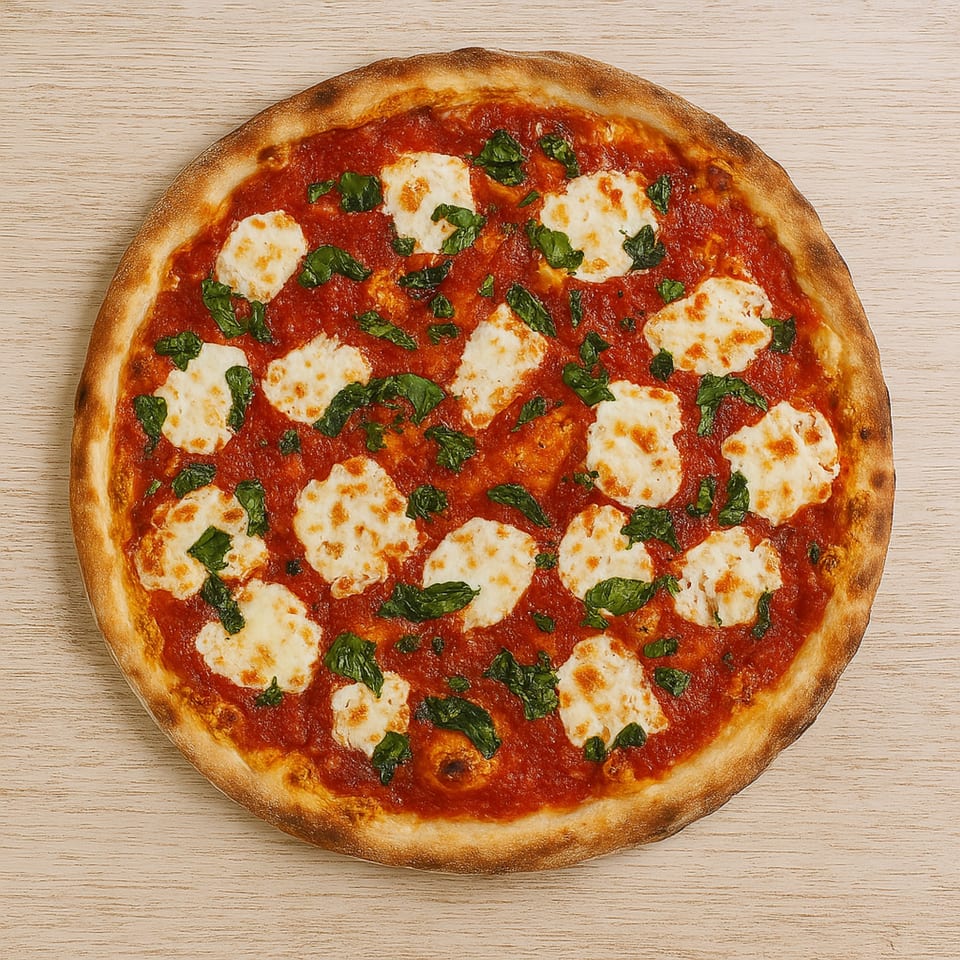 A whole Roma Pizza Margherita with fresh mozzarella, basil, and tomato sauce.